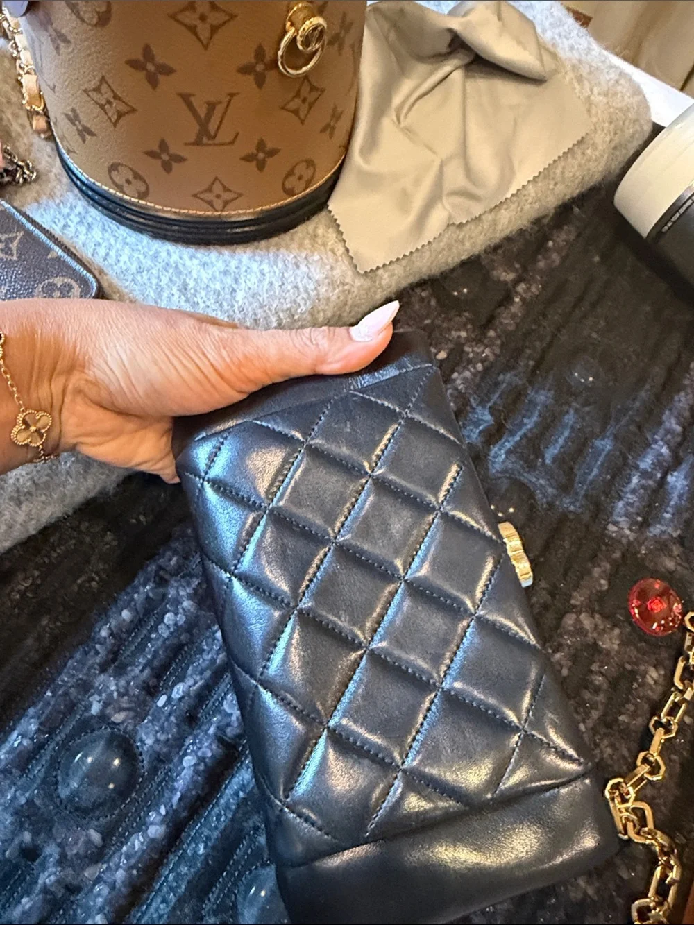 CHANEL Black Quilted Leather Triple-Compartment Wallet with Gold CC